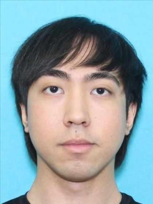 FBI photo of AUSTIN JAN SY YATCO