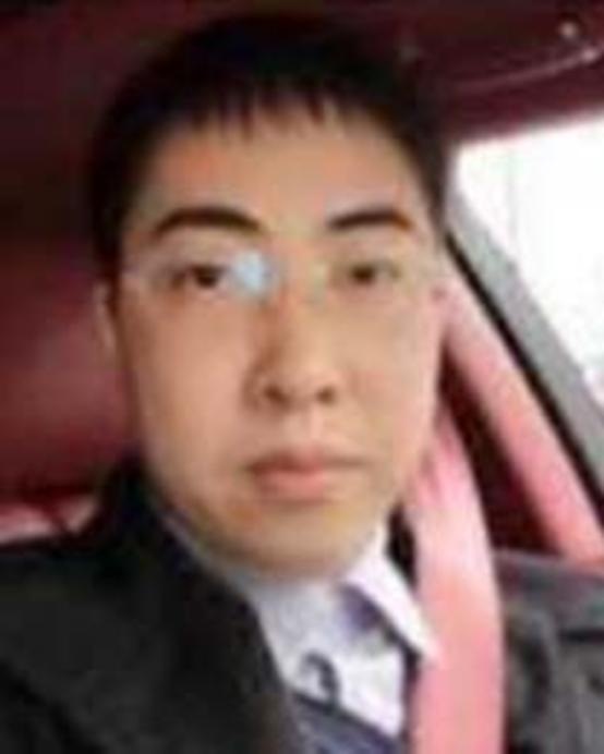 FBI photo of TAN DAILIN