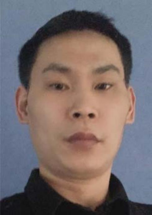 FBI photo of XINJIANG JIN