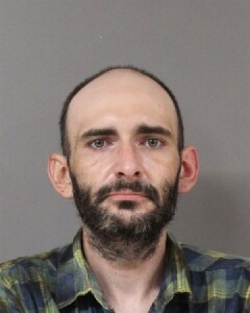 Mugshot of JUSTIN THOMAS