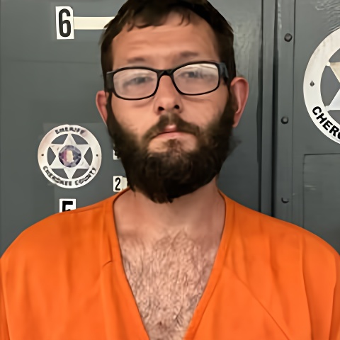 Mugshot of JUSTIN SMITH