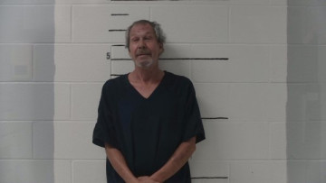 Mugshot of Thomas Coleman Elder