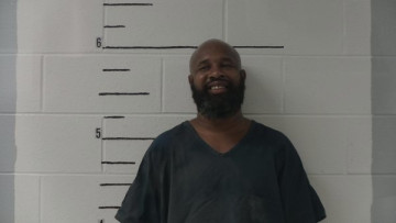 Mugshot of Clarence Emmett Askew