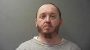 Mugshot of JUSTIN JAMES