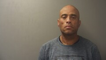 Mugshot of CEDRIC GHOLSTON