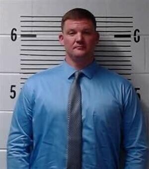 Mugshot of LEE