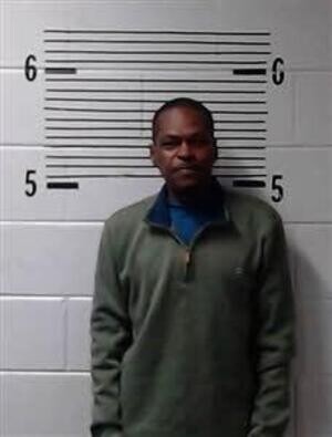Mugshot of SIMS