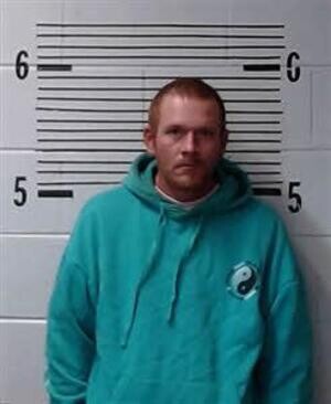 Mugshot of WHITMOORE