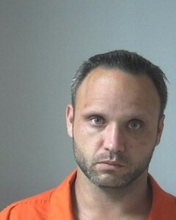 Mugshot of TRAVIS SNOW