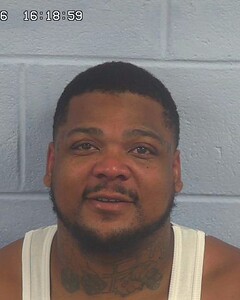 Mugshot of JUSTIN BREWSTER