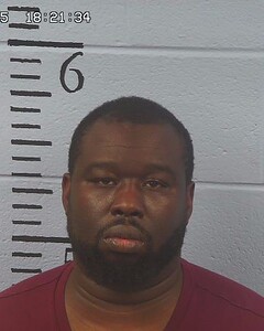 Mugshot of TOSTIG MOORE