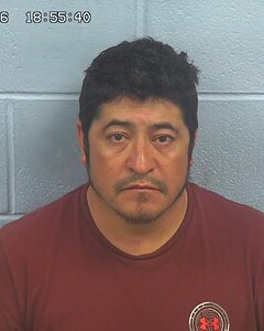Mugshot of JULIAN ALVA CANO