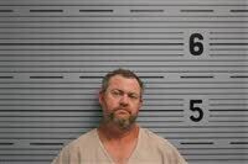 Mugshot of JOHN MOORE