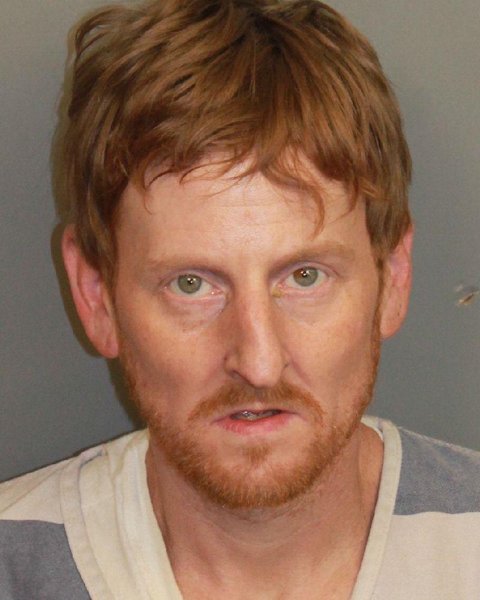 Mugshot of JUSTIN ALAN RAYBURN