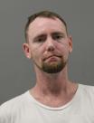 Mugshot of CLAUDE DEXTER TATE