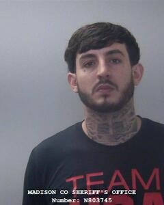 Mugshot of TANNER M BREWER