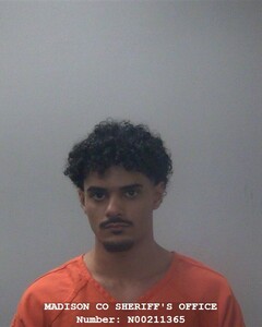 Mugshot of ALHUSAIN A MUZAYAD