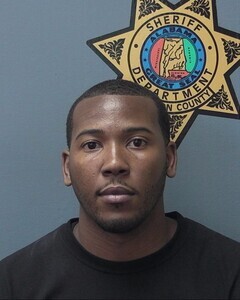 Mugshot of REUBEN O TAYLOR