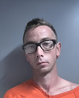Mugshot of DANIEL BAUGH