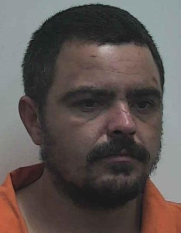Mugshot of CHARLES HOWARD EVANS
