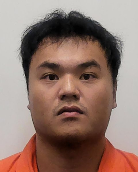 Mugshot of KUAN YI TSOU
