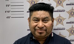 Mugshot of CORNELIO ATJUN