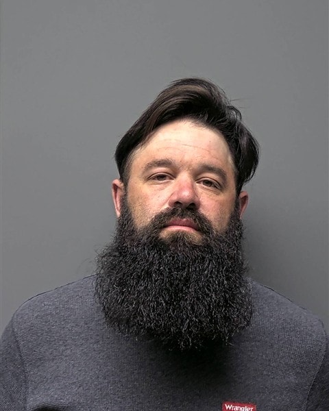 Mugshot of C REED