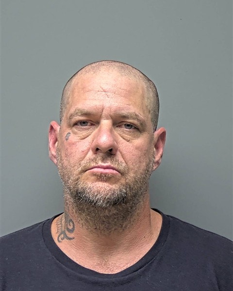 Mugshot of C REED