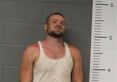 Mugshot of CASEY MOORE