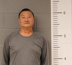 Mugshot of DAJUN SUN