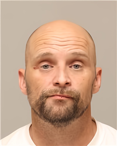 Mugshot of CORY ALLEN WUOLLET