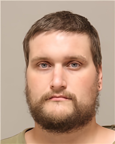 Mugshot of KYLE DAVID ESNOUGH