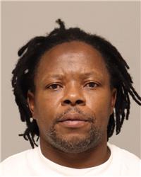 Mugshot of GASTON DIAGHA KUM