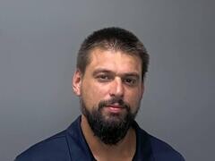 Mugshot of TYLER L ACKROYD