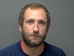 Mugshot of DUSTIN M SANDOVAL
