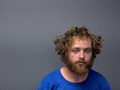 Mugshot of DALTON T JONES