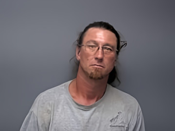 Mugshot of ANDREW C METZGER