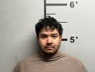 Mugshot of JUSTIN WILFREDO RODRIGUEZ