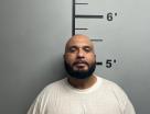 Mugshot of CESAR GLOMERY JR GUZMAN