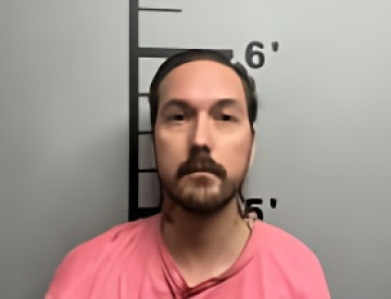 Mugshot of MATTHEW TANNER BAUGUS
