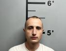 Mugshot of TREVOR DELAPORTE