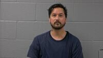 Mugshot of MATTHEW T BAUGUS