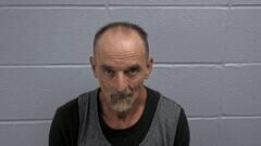 Mugshot of MATTHEW W MOORE