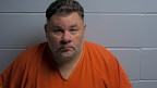 Mugshot of ROBERT G DOYAL