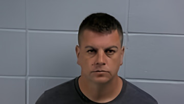 Mugshot of JUSTIN M WAMMES