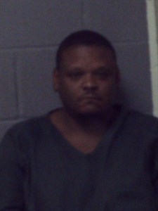 Mugshot of John E Mitchell