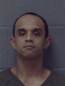 Mugshot of Elvis Cruz