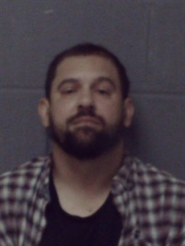 Mugshot of Claudemir Mendes Costa