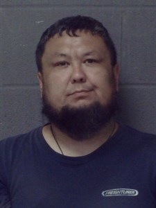 Mugshot of Serik Tursumbayev