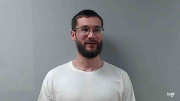 Mugshot of GRAYSON HUFSTETLER